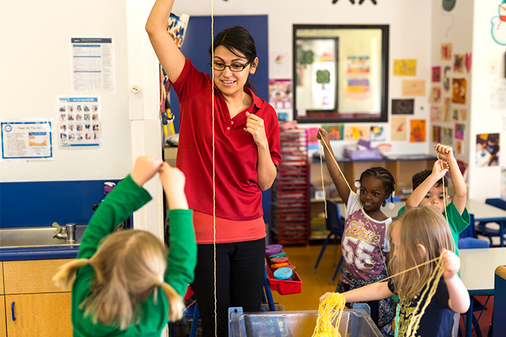 Teacher engaged in a classroom activity